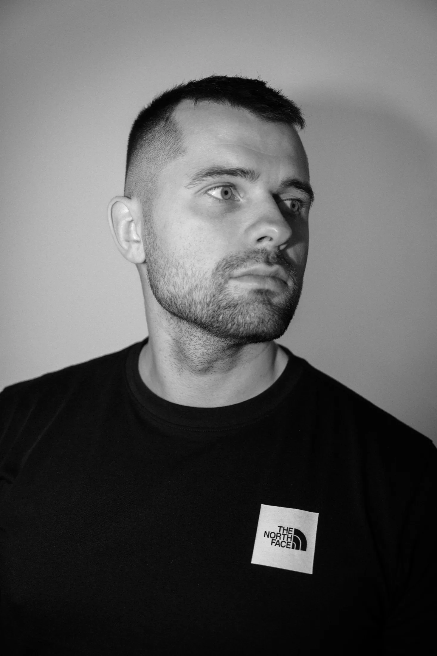 Lukáš Granatier, a side-looking portrait