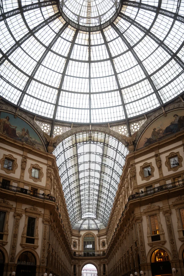 Looking up into the glazed dome of a historic shopping gallery